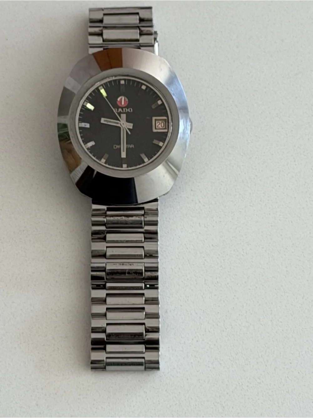 Rado Vintage Stainless Steel Watch with Black Dial and Red Logo